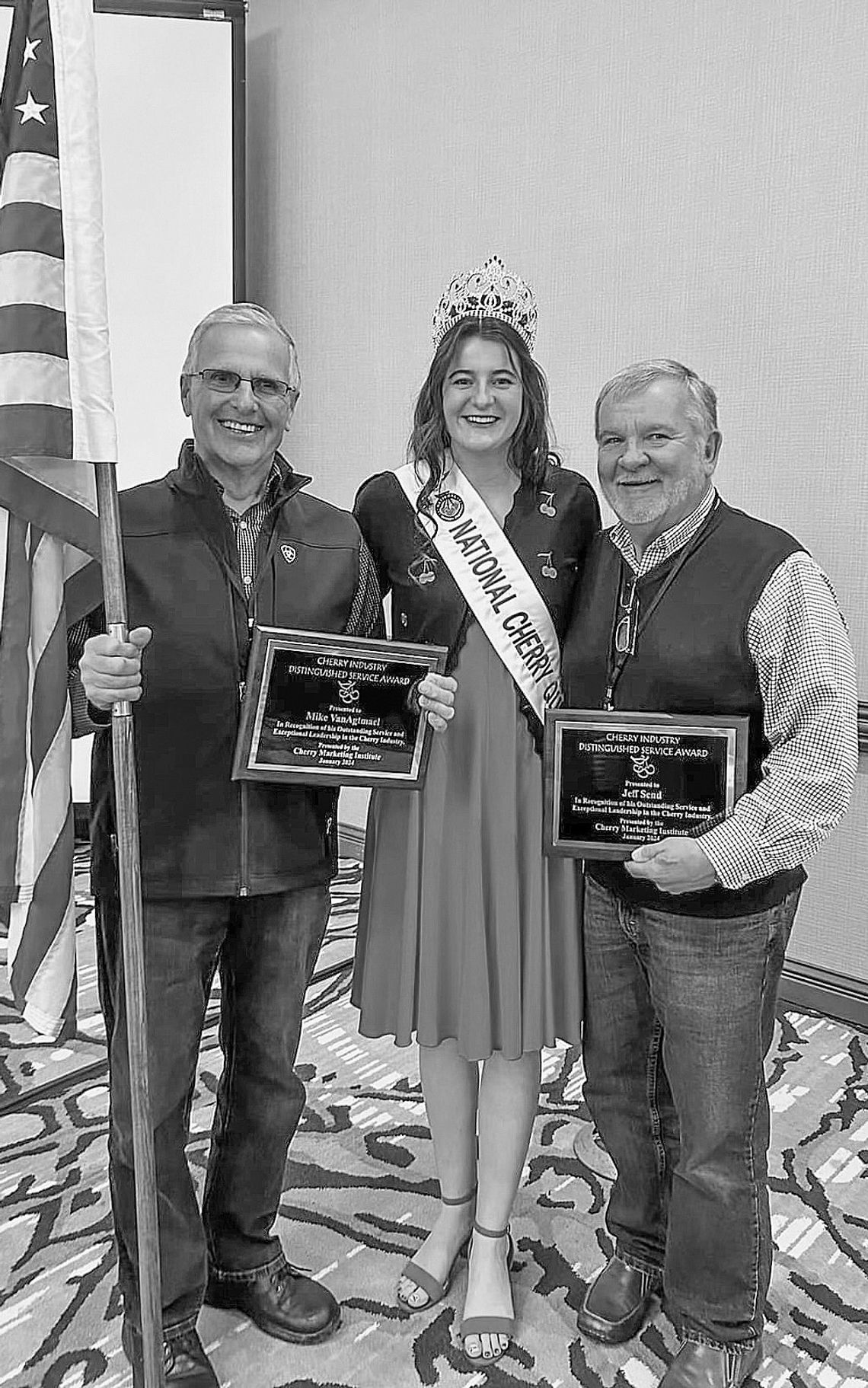Two long-time cherry industry advocates were provided distinguished service awards in 2024 by the Cherry Marketing Institute. From left are Mike Van Agtmael, National Cherry Festival queen Carmen Beemer, and Jeff Send from Leelanau County. Courtesy photo
