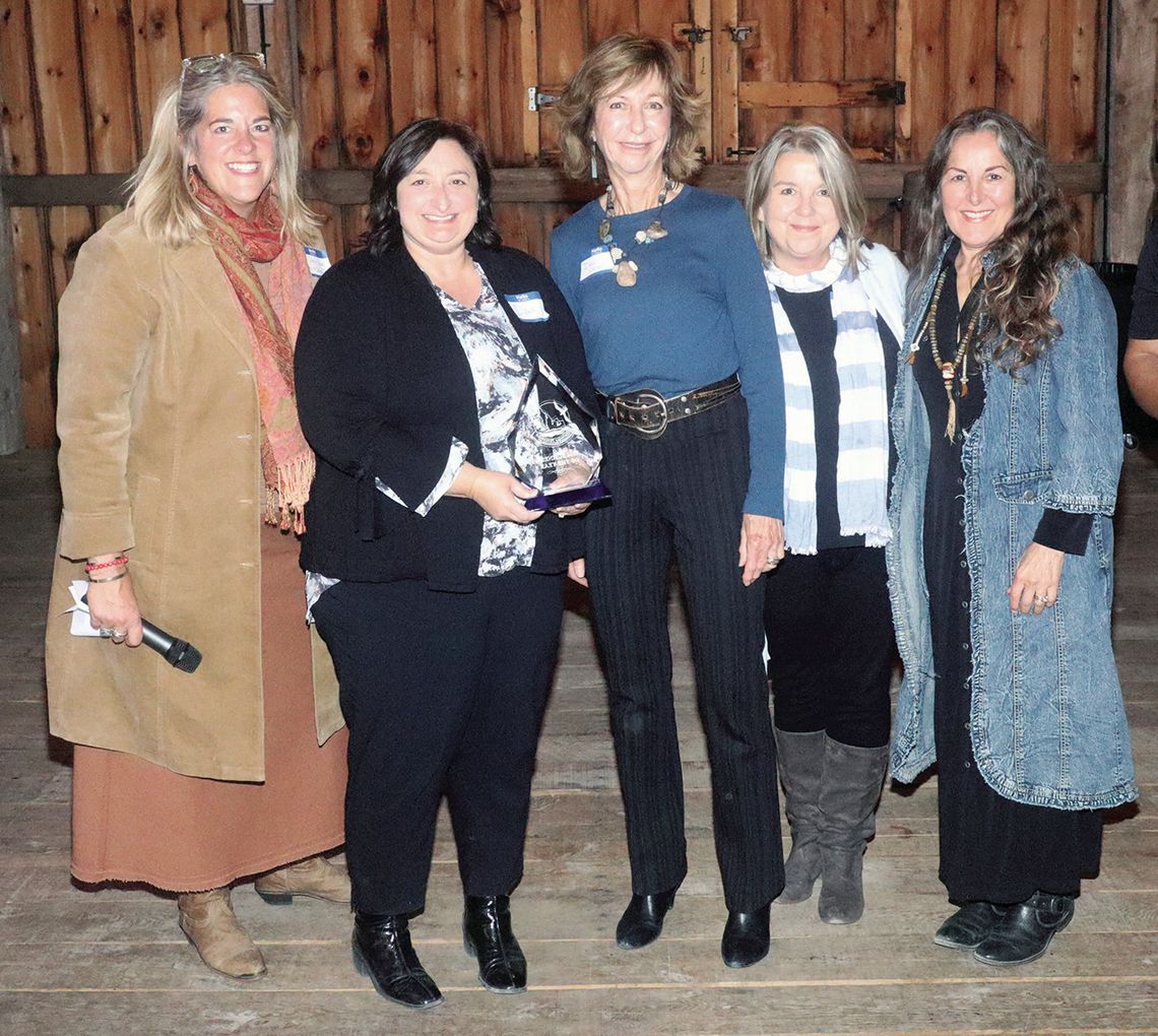 The Leeleanau Chamber of Commerce awarde Sharecare with the 2024 Business of the Year Award Thursday during a banquet at French Valley Vineyards. From left to right: Jamie Jewell, Dawn Bousamra, Dale Lersch, Sally Bancroft and Jennie Arguello accept the 2024 business of the year award for...