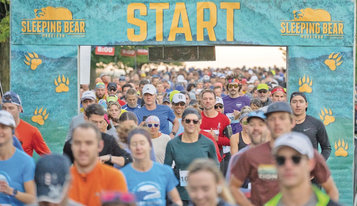 Runners start the Sleeping Bear Marathon at Empire Beach that weaves throughout the Sleeping Bear Dunes National Lakeshore for most of the day Saturday starting at 7:30 a.m. Photo courtesy of Focal Flame Photography