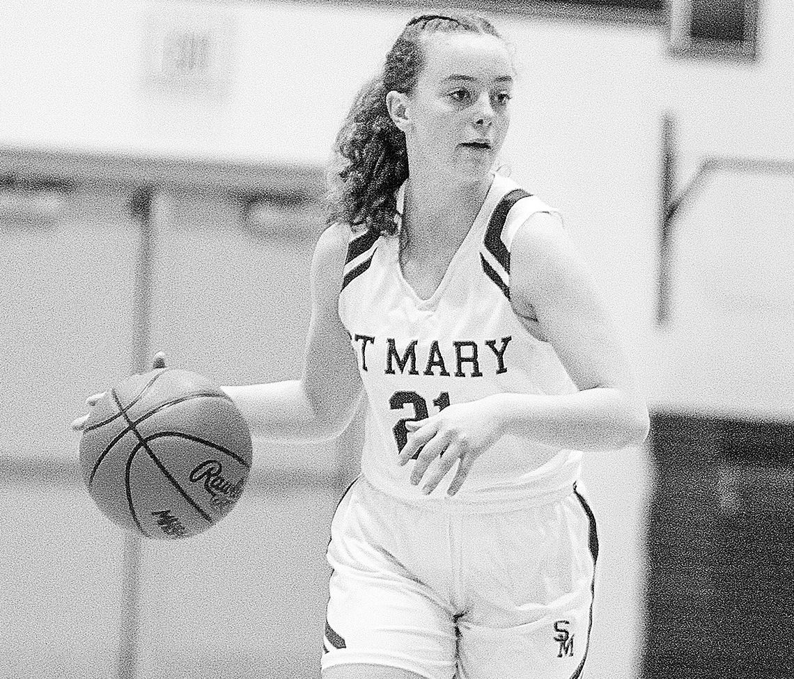 Lake Leelanau St. Mary guard Muriel Korson dribbles right during a 61-39 win over Onekama last week. Enterprise photo by Brian Freiberger