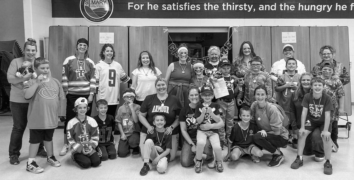 St. Mary K-5 students and their mothers participated in the second annual St. Mary Mother/Son Tournament of Champions St. Mary K-5 students and their mothers participated in the second annual St. Mary Mother/Son Tournament of Champions. Moms and sons competed in a series of different minute-to-win-it style game/competitions. Score cards were kept and a champion team was crowned for obtaining the most poin...