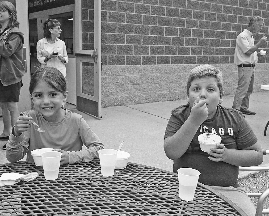 St. Mary students Maggie and Walter Campillo enjoy a back-to-school ice cream social. Enterprise photo by Brian Freiberger