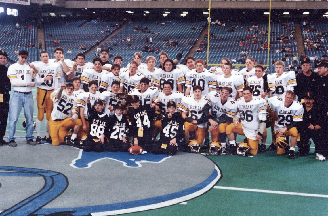 The 1994 Glen Lake Lakers celebrate after winning the schools first state championship after defeating Our Lady of the Lakes Waterford 20-10. Courtesy photo