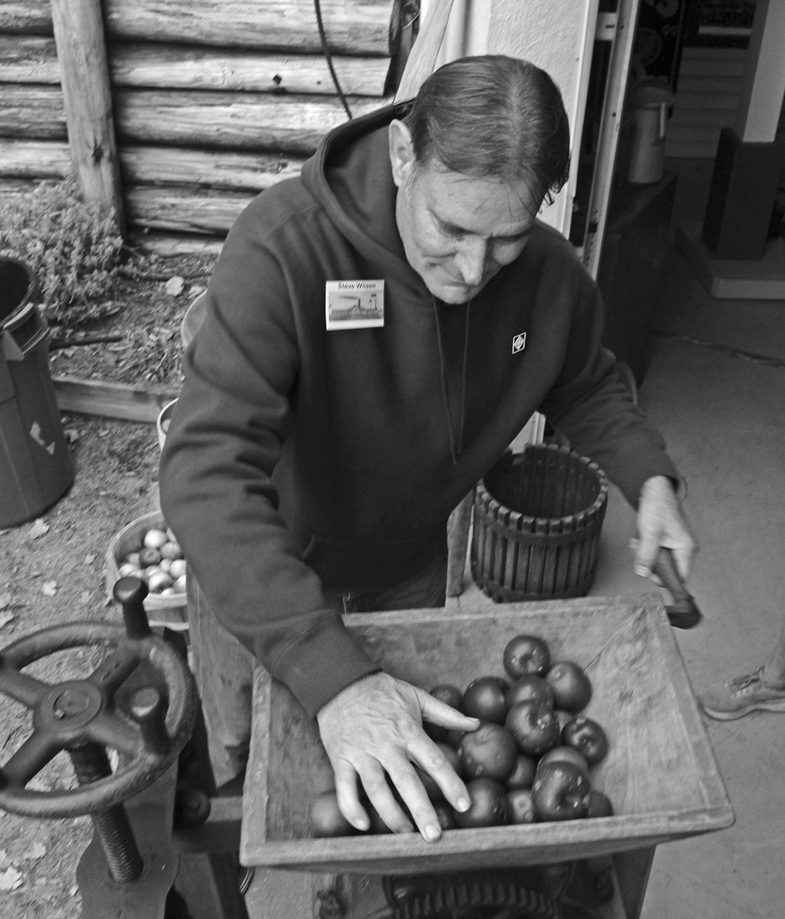 Steve Wilson Steve Wilson helps demonstrate how to make apple cider during Heritage Days at the Empire Area Museum Saturday. Enterprise photo by Brian Freiberger