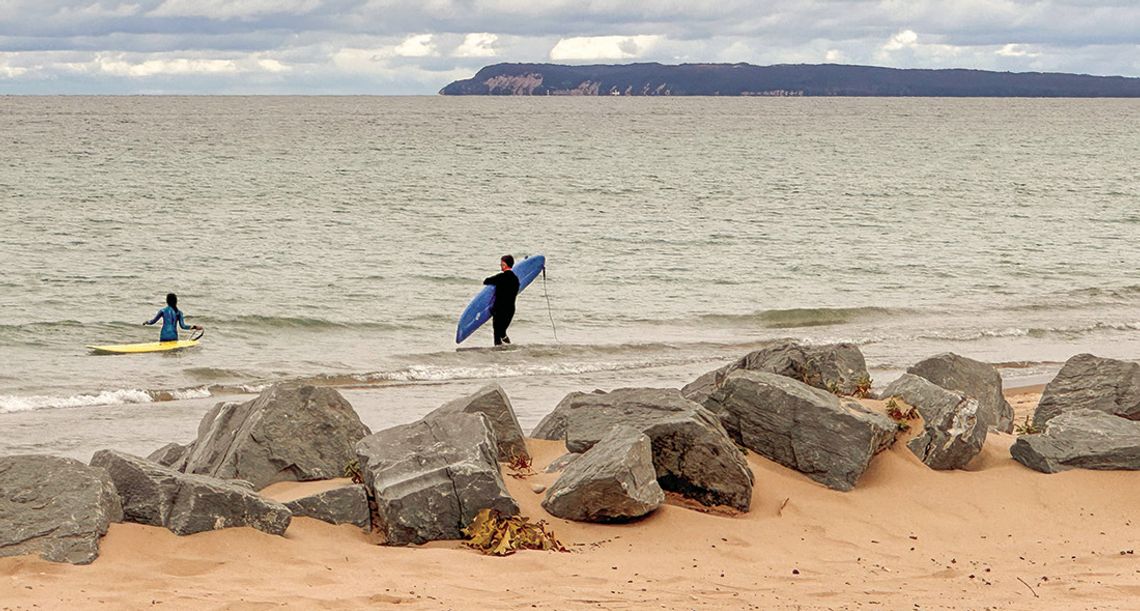 Surf boarders donned wet suits before heading out on Lake Michigan