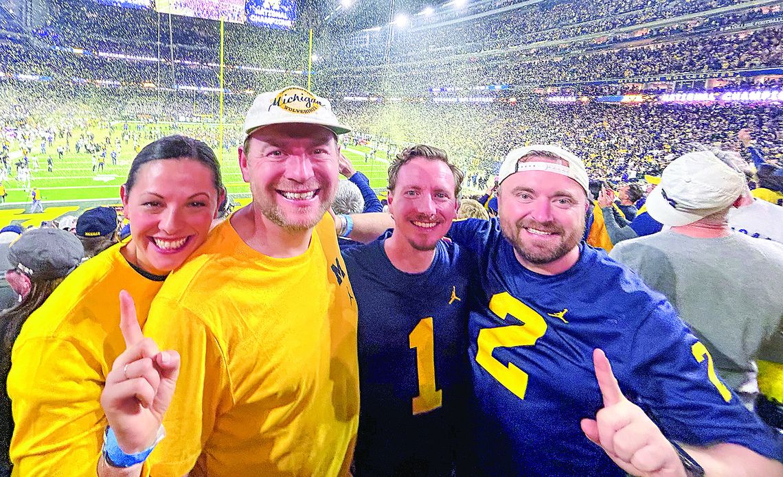 Michigan alumni with Leelanau ties are filled with joy after the Wolverines won the College Football Playoff National Championship against Washington on Monday. From left to right: Chelsea Suttmann, Noah Suttmann, Jonathon Williams, and Logan Suttmann smile as the confetti falls in Houston...