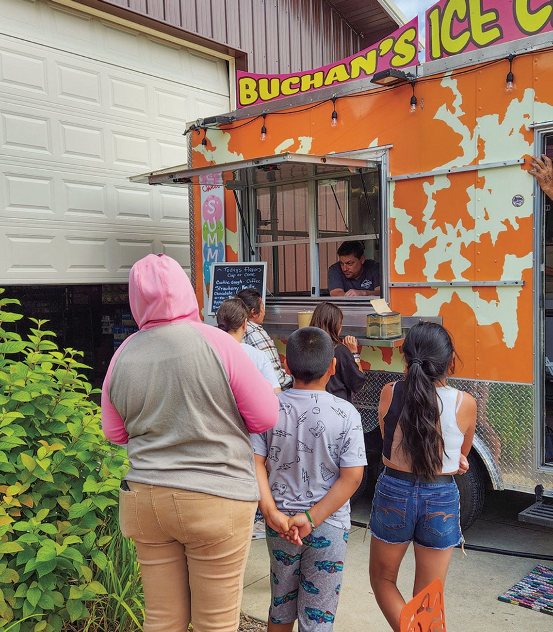 Buchan’s Scoops 22 ice cream truck treated volunteers and patrons at Leelanau Christian Neighbors Monday. Enterprise photo by Brian Frieberger