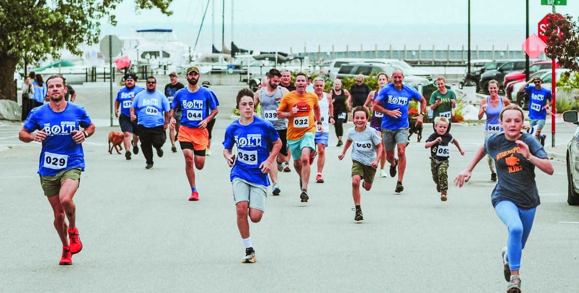 Runners sprint up Braman Hill during the “Bolt to Braman” foot race last year. The Bolt 5 will happen on Saturday, Aug. 31 at 11 a.m. Courtesy photo