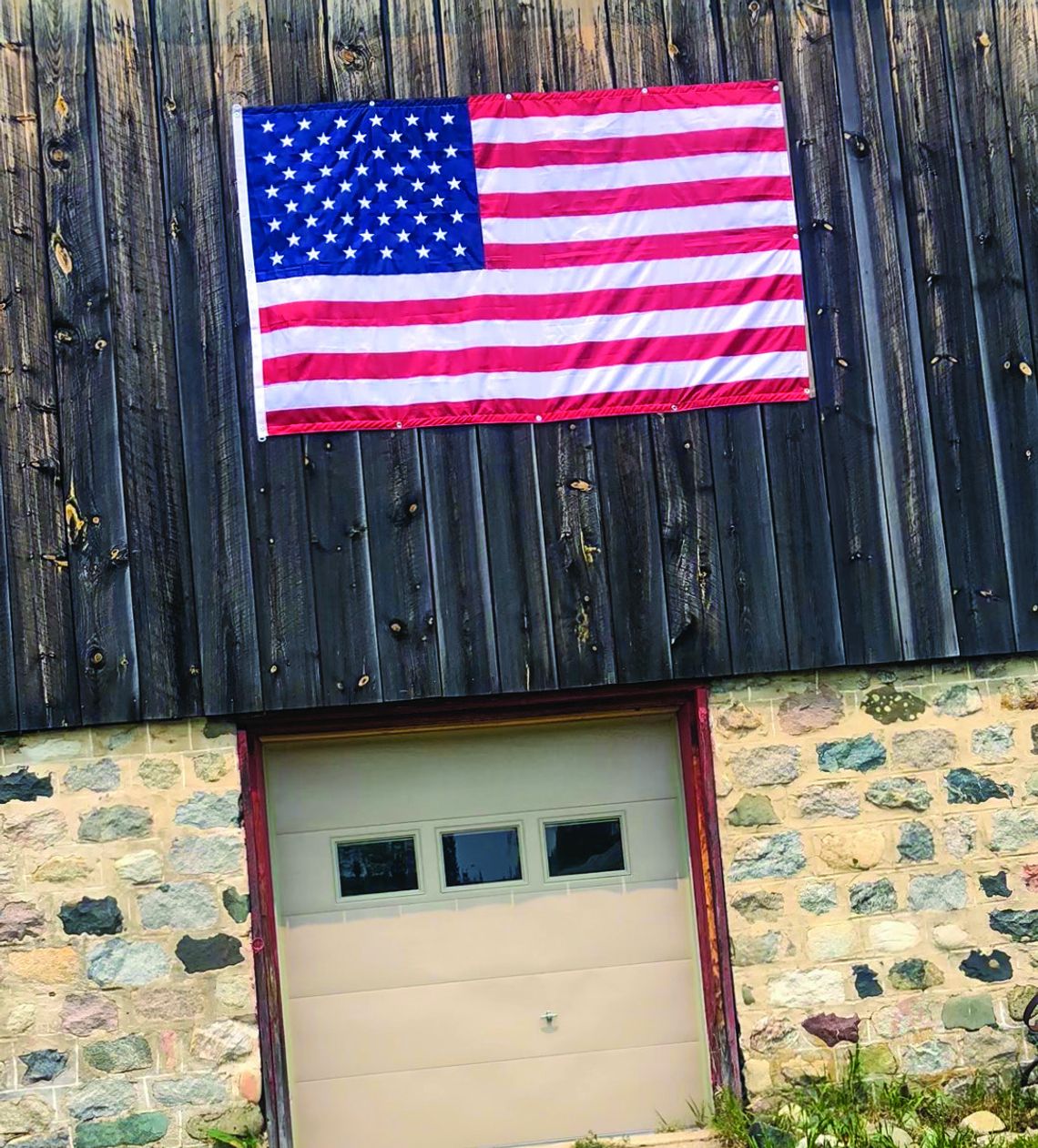 The flag’s 13 red and white stripes represent the 13 original colonies