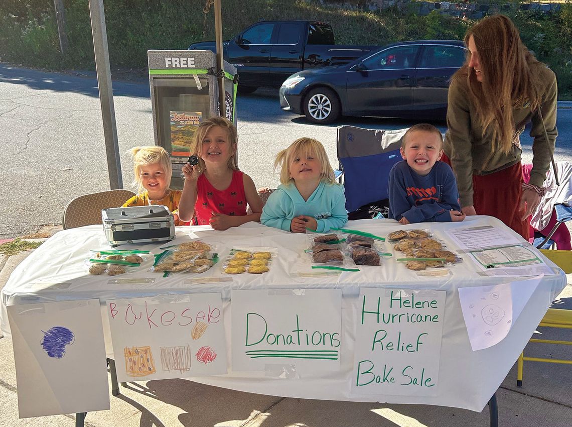The grandchildren of Barb and Keith Plamondon of Lake Leelanau held a bake sale Friday with proceeds going to hurricane relief. Also photographed, right, is mother/aunt Melissa Cholowinski. See story on Pg. 13. Photo courtesy of Joe Hubbell