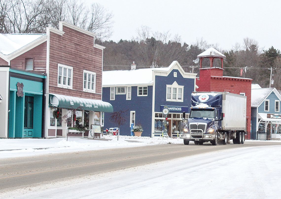 The Leelanau Road Commission The Leelanau Road Commission and private snow plowing businesses made quick work of clearing roads for commuters after a snow storm dropped several inches and canceled school in the area. An 18-wheeler is seen passing through Suttons Bay with ease on Wednesday. Enterprise photo by Brian Fr...