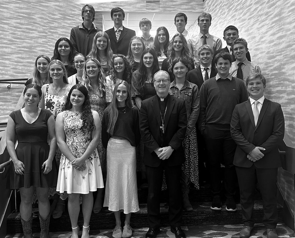 The St. Mary School chapter of Teens for Life The St. Mary School chapter of Teens for Life, recently attended the Focus on Life Annual Benefit Dinner at the Grand Traverse Resort. Students pose with Bishop Jeffrey Walsh from the Diocese of Gaylord during the event.
