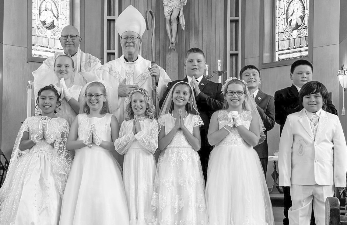 Third graders from Lake Leelanau St. Mary made their first communion and reconciliation Sunday