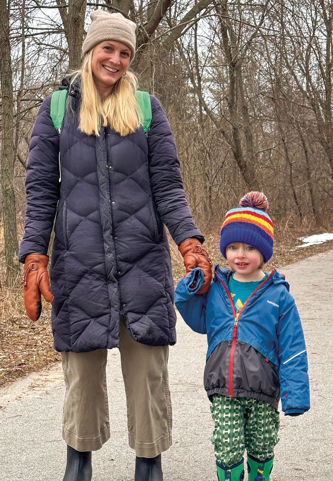 Tracy Smedes-Hepler and her friend, Luca, 3 Tracy Smedes-Hepler and her friend, Luca, 3, enjoyed some fresh air and exercise Tuesday, walking on the Leelanau Trail in Suttons Bay. Enterprise photo by Amy Hubbell