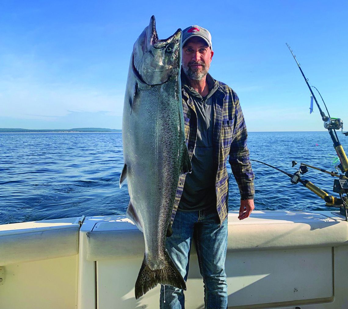 A salmon that neared 20 pounds was caught earlier this month aboard the Mariah charter boat off the shores of North Manitou Island. Courtesy photo