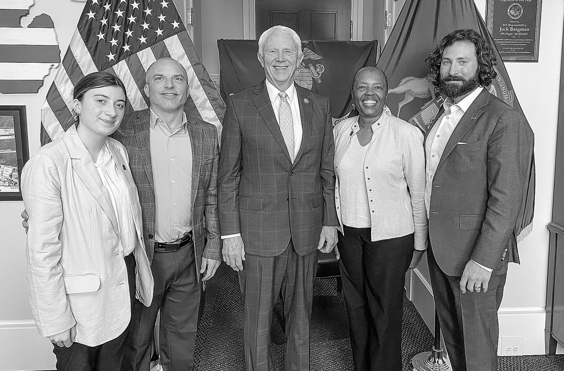 Addison and Eric LaPugh (left) stand with Michigan congressman Jack Bergman on behalf of the National Parks Conservation Association. Courtesy photo