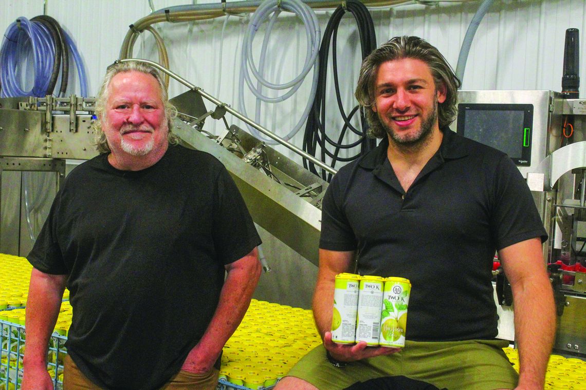 Adam Satchweil (left) and Kurt Barry (right) lead the winemaking efforts for Two K Farms Cidery &amp; Winery. Enterprise photo by Brian Freiberger