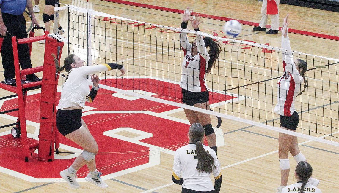 Glen Lake senior Peyton Brown spike the ball against Suttons Bay during the Norse last home game of the season.