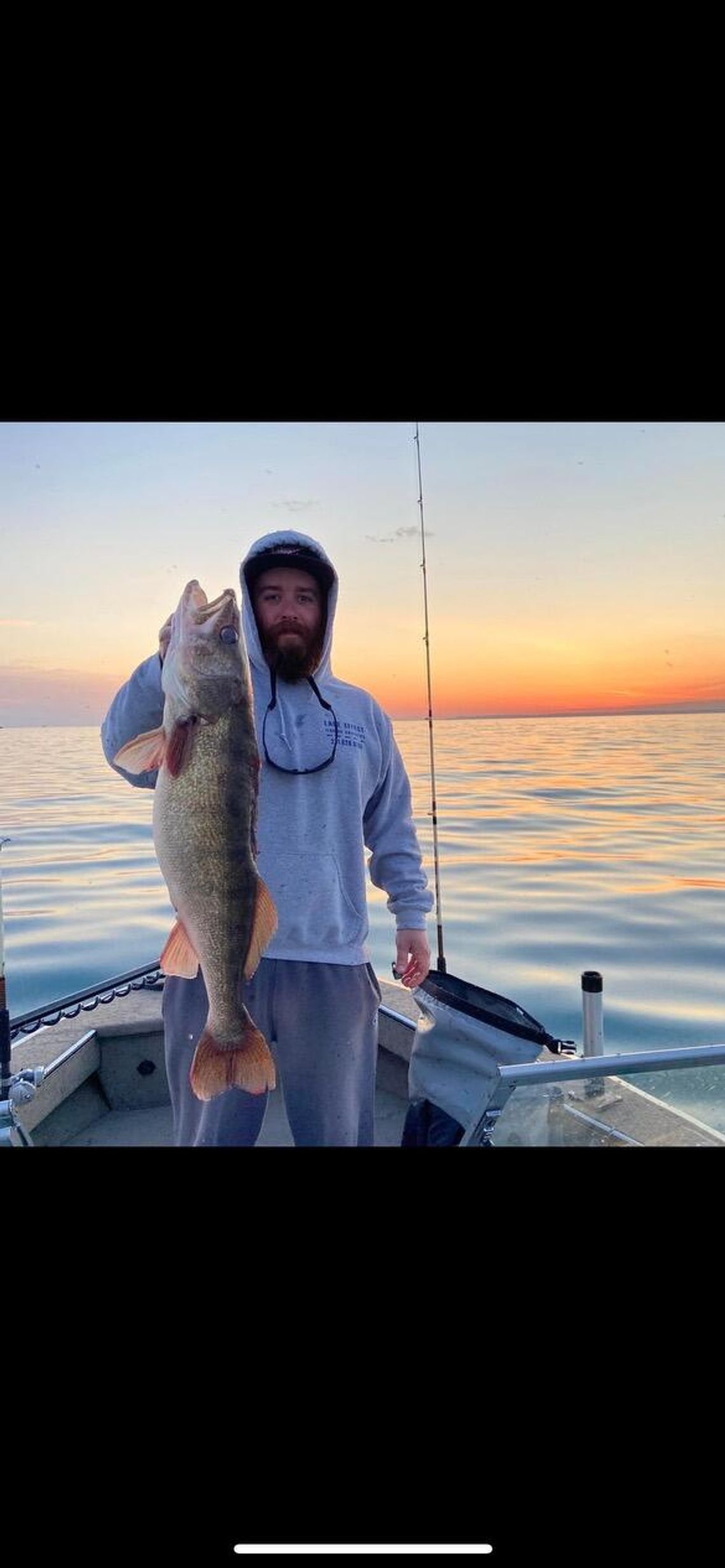 Greg Alsip is pictured after catching a walleye on Lake Michigan. Courtesy photo