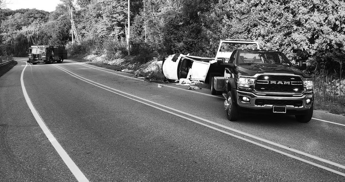 The driver of this trashed vehicle was arrested after crashing on S. Lake Leelanau Drive. Photo courtesy of Frank Maly
