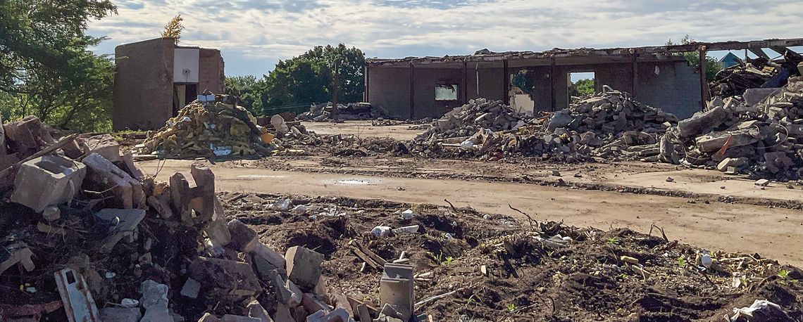 The exterior demolition of the former Leelanau Memorial Hospital, pictured here on Tuesday morning, is progressing and currently underway. Photo courtesy of Allan Dalzell